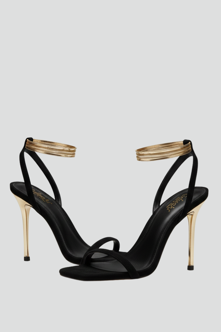 Elegant women's black ankle wrap heeled sandals with slim straps, perfect for evening wear & parties.