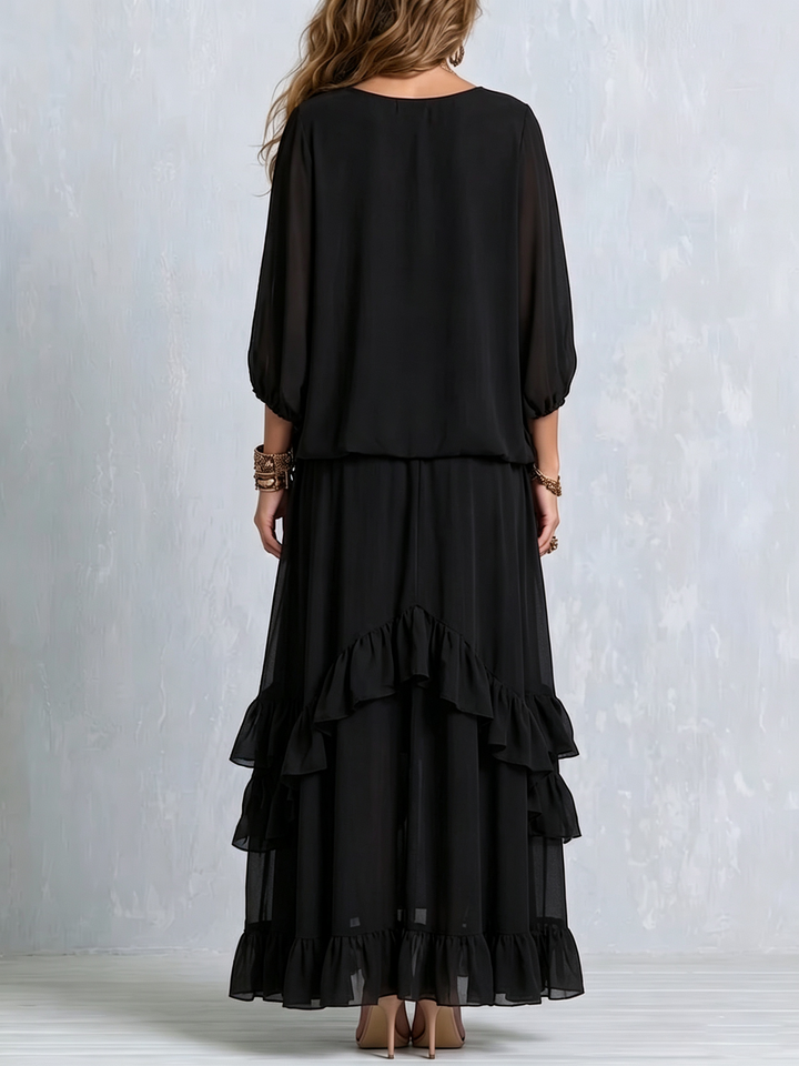 Chic women's black two-piece boho maxi skirt set, featuring a flowy tiered design ideal for garden parties & events.