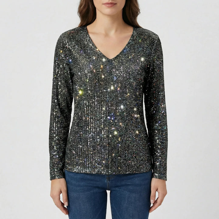 Glamorous women's V-neck shimmer long-sleeve blouse, featuring elegant fabric, perfect for a chic party look.