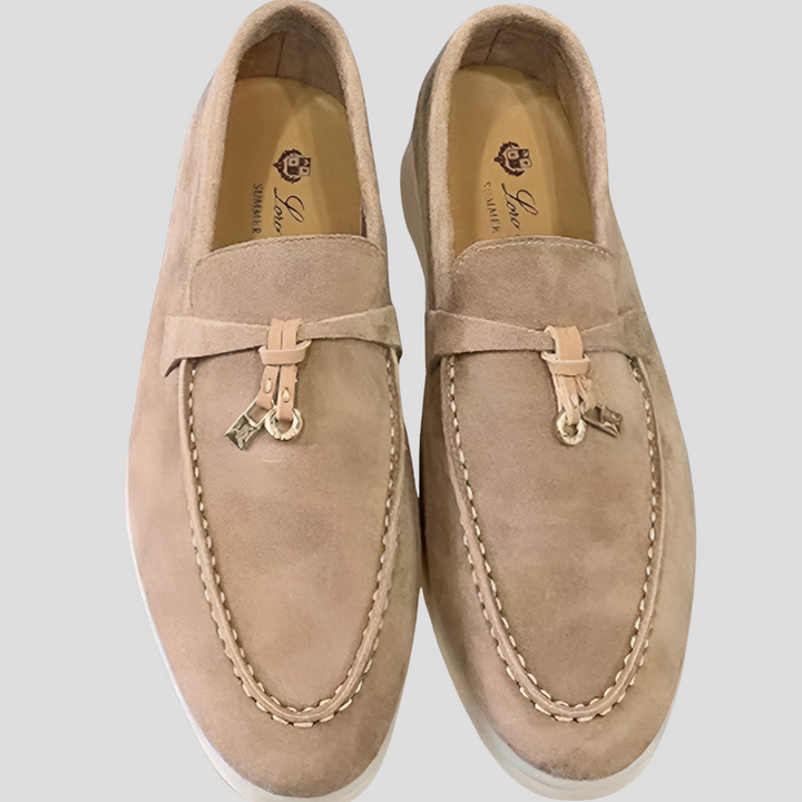 Sophisticated ladies' tassel loafers in genuine leather, offering elegant comfort for any occasion.