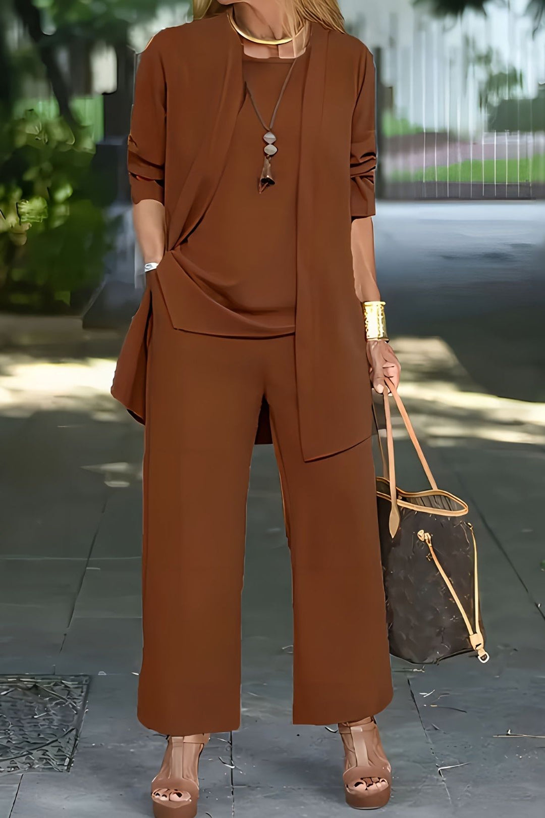 Women's elegant darkbrown three-piece outfit, a tailored set perfect for office, travel, & casual wear.