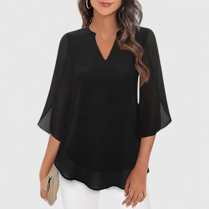 Elegant women's top; a chic long sleeve blouse designed for sophisticated office and evening wear.