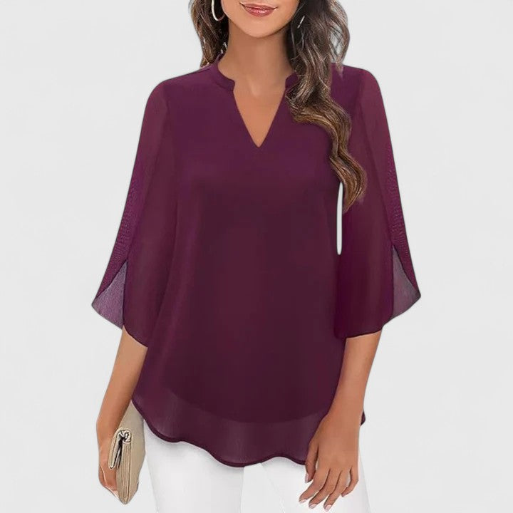 Sophisticated ladies' fashion blouse, an elegant choice for both professional and evening attire.