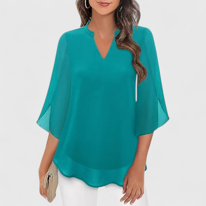 Versatile women's chic blouse; an elegant long sleeve top for office, evening, or casual elegance.