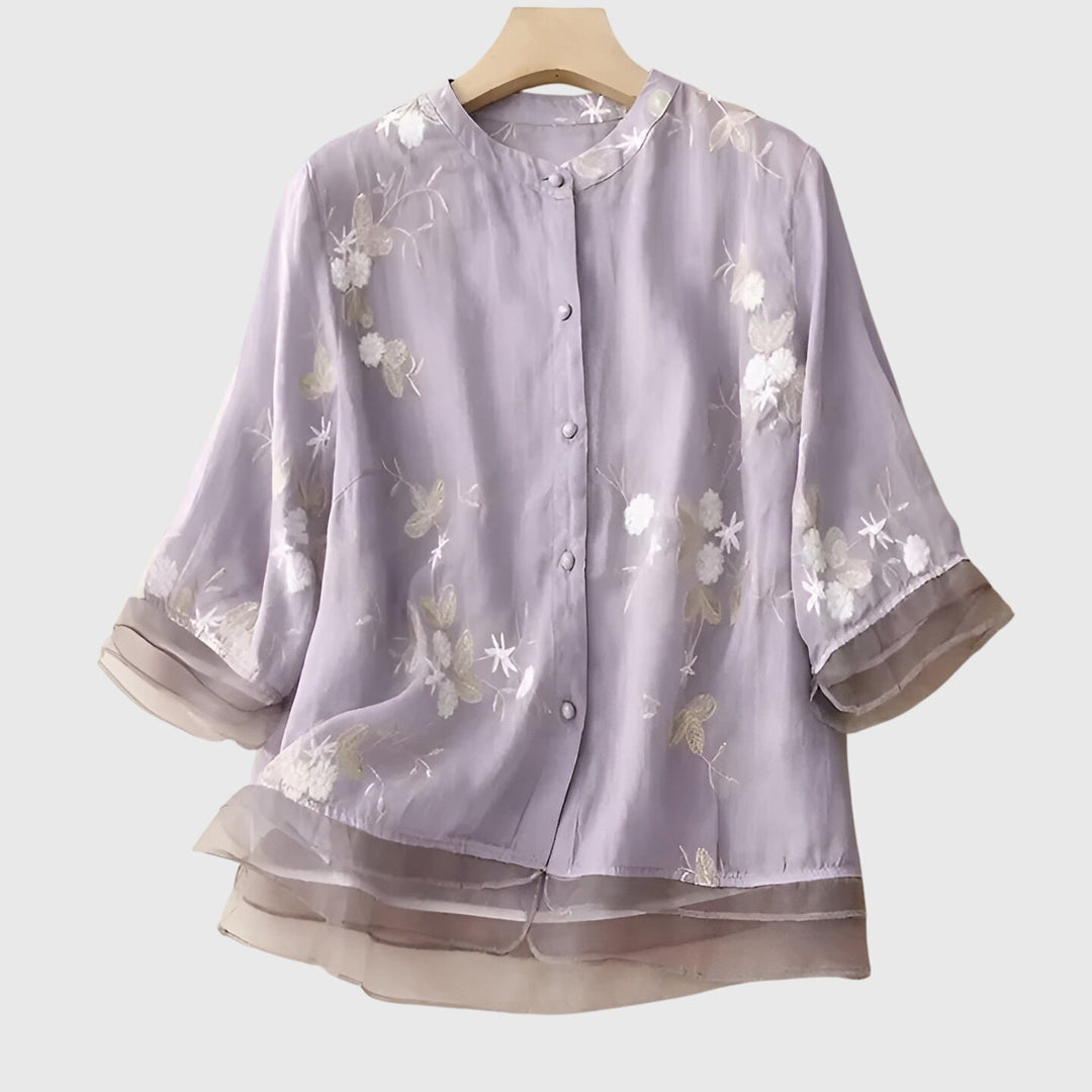 Versatile women's top with beautiful floral embroidery, an elegant yet casual blouse for any spring or summer event.
