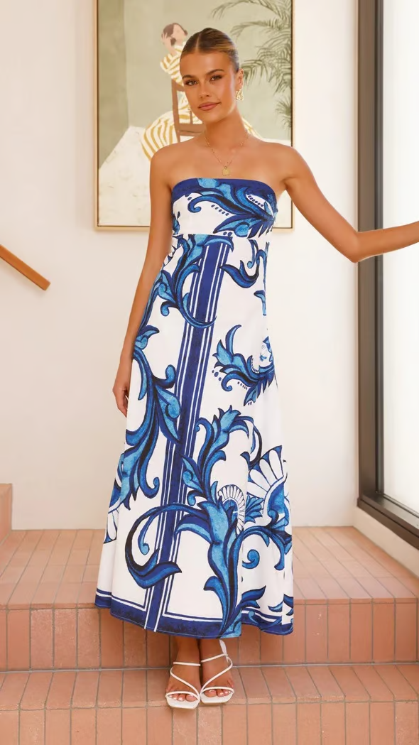 Light blue printed flowy dress for women, short sleeves, elegant summer style & comfortable.