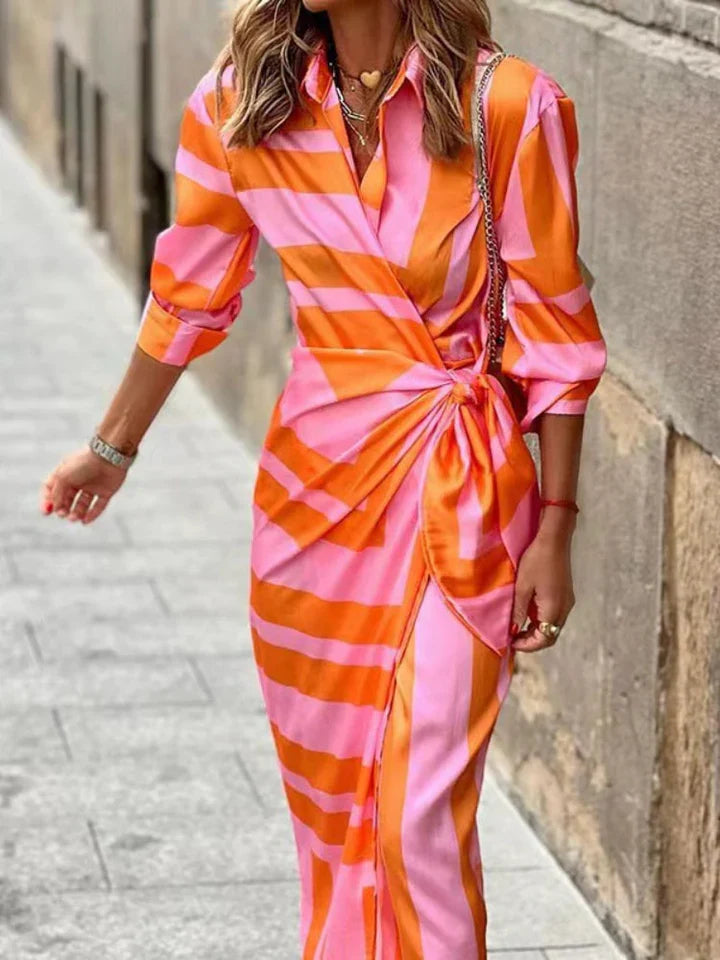 Elegant women's blue wrap front midi dress with tie waist. Perfect for summer and spring daywear.