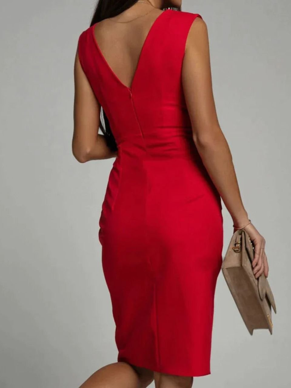 Luxurious purple women's bodycon midi dress. V-neck, sleeveless cut, and a stylish side slit for elegant parties.