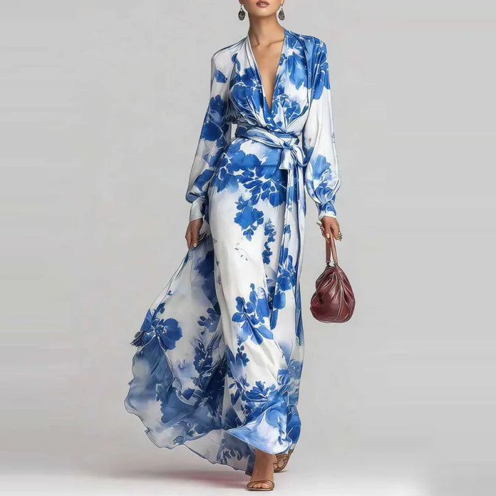 Flowy blue bohemian V-neck maxi dress for women, featuring elegant lantern sleeves and comfortable fit.