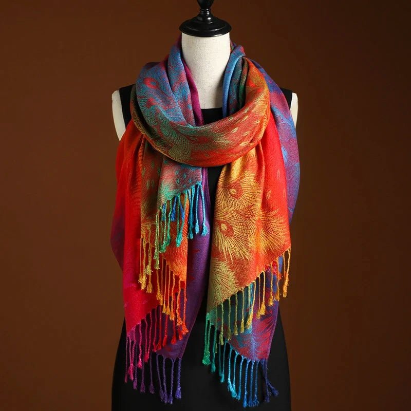 Elegant women's bohemian shawl with vibrant peacock pattern and long fringe. Versatile fashion wrap for any occasion.