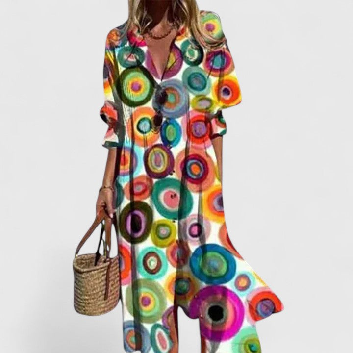 Chic women's boho dress, vibrant & elegant, offering comfortable, versatile style for effortless summer.