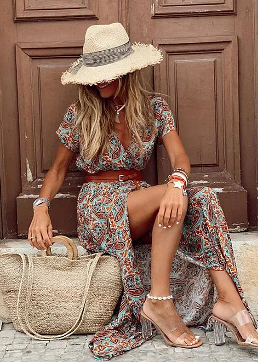 Versatile women's flowy maxi dress in boho style with a matching belt, suitable for casual summer or elegant events.