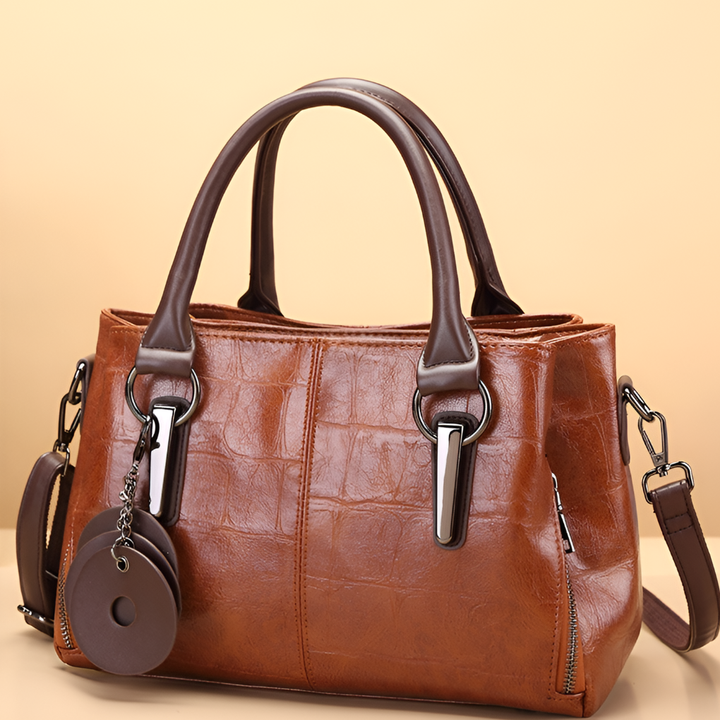 Elegant women's Boston handbag with luxurious croc embossing, perfect for an everyday stylish look.