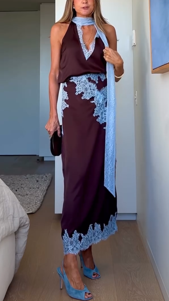 Elegant women's brown tie-dye maxi dress with halter V-neck, flowing fabric & side slit. Perfect for summer vacations.