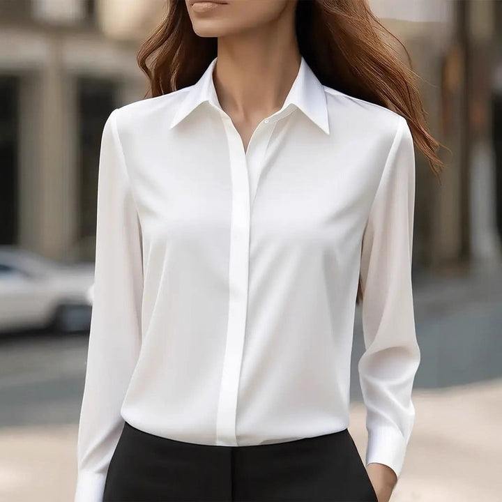 Casual chic women's blouse, button-front, long sleeve, a versatile and sophisticated fashion staple.