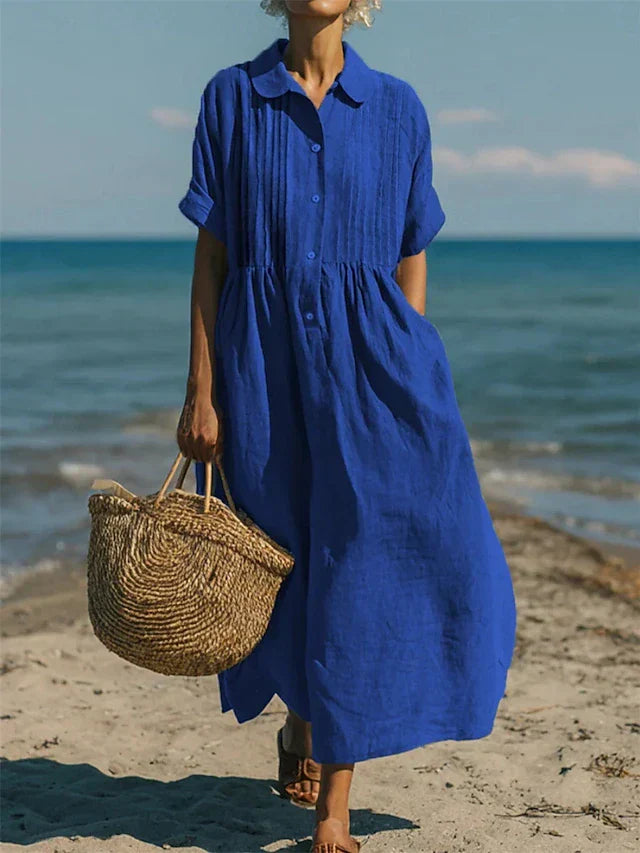 Stylish women's button-front shirt style maxi dress, ideal long dress for sophisticated spring fashion.