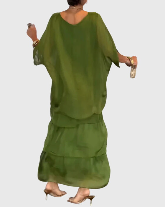 Relaxed fit women's maxi dress, elegant and flowy, button-up front, perfect for parties.