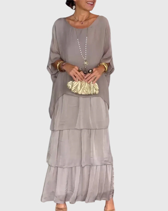 Elegant women's party dress, button-up maxi style, relaxed fit, ideal for evening wear.