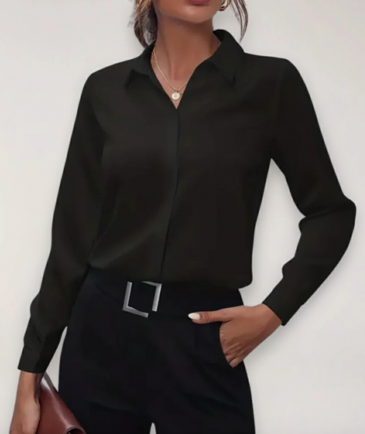 Elegant women's buttoned office blouse in a professional style, perfect for work attire.