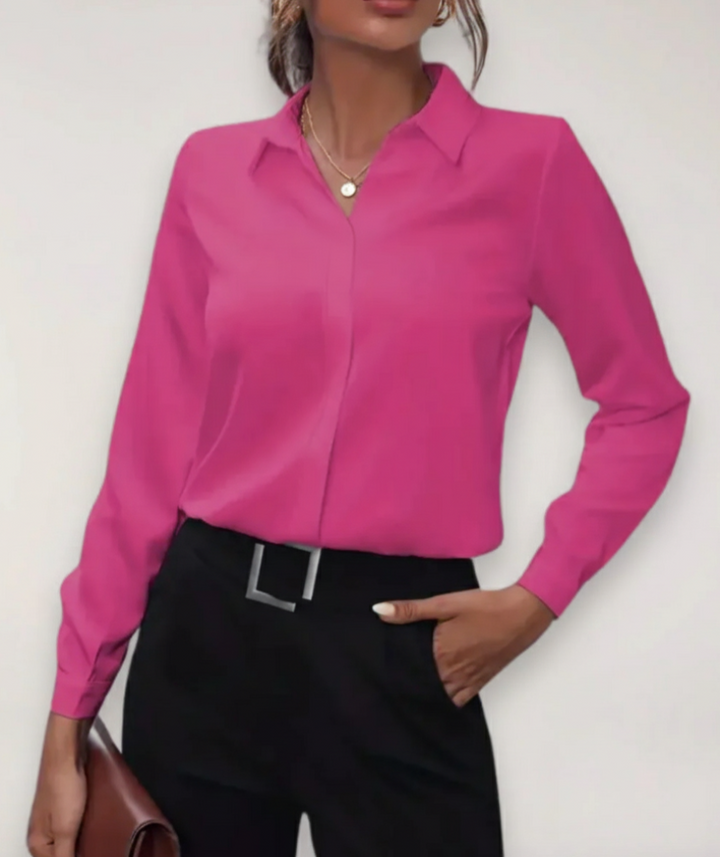 Professional women's top with elegant buttons, a versatile choice for office and formal settings.