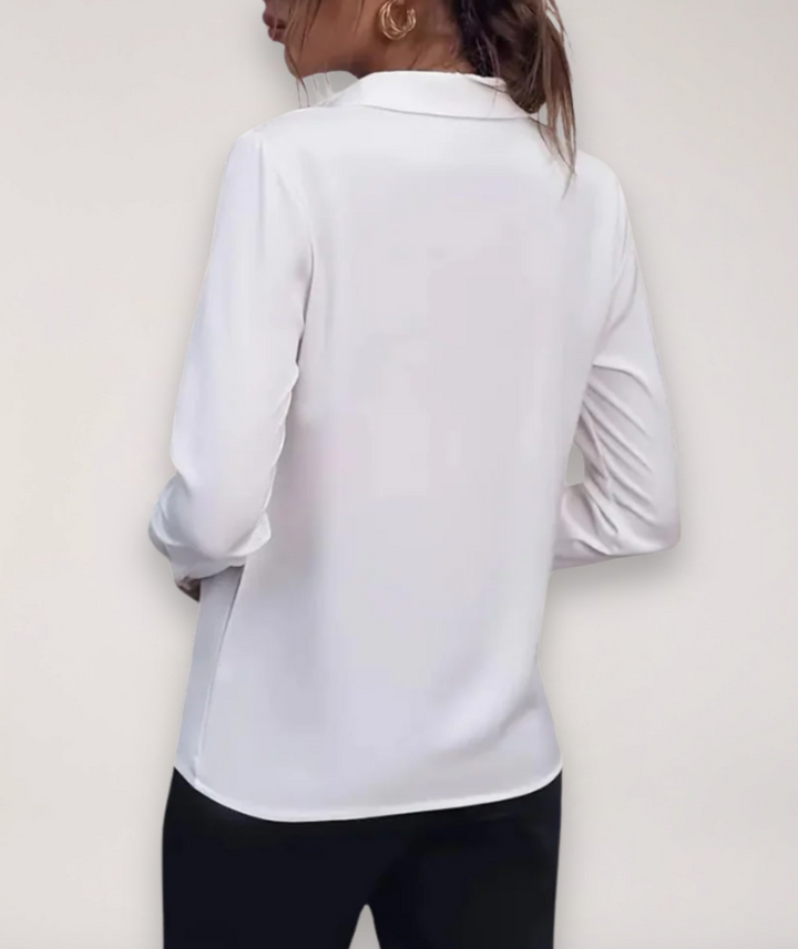 Sophisticated women's elegant buttoned blouse, a classic professional top for any office environment.
