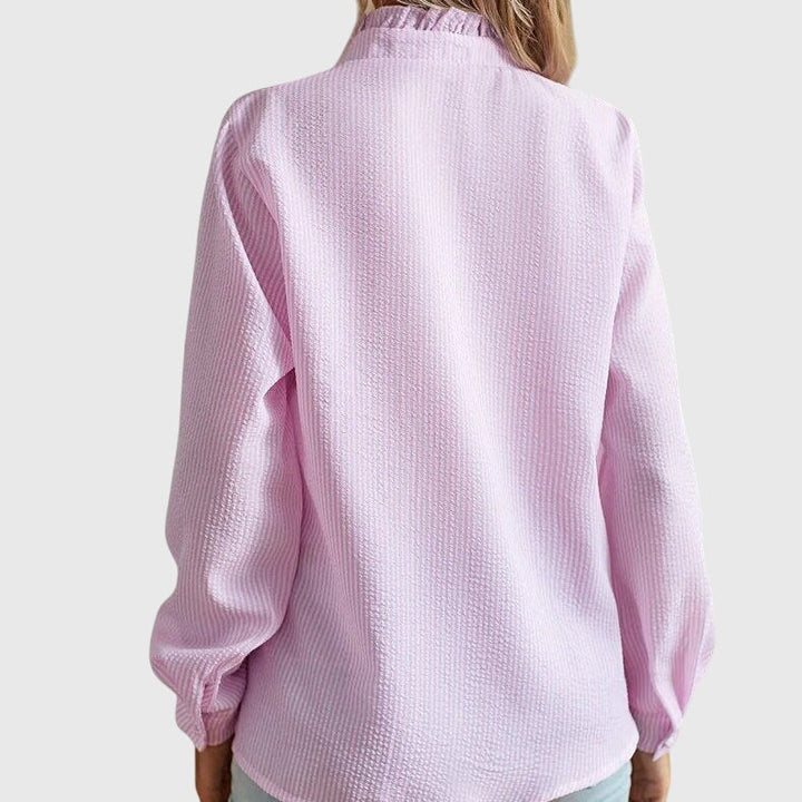 Flattering women's long sleeve blouse for spring, an elegant top and chic shirt for versatile fashion.