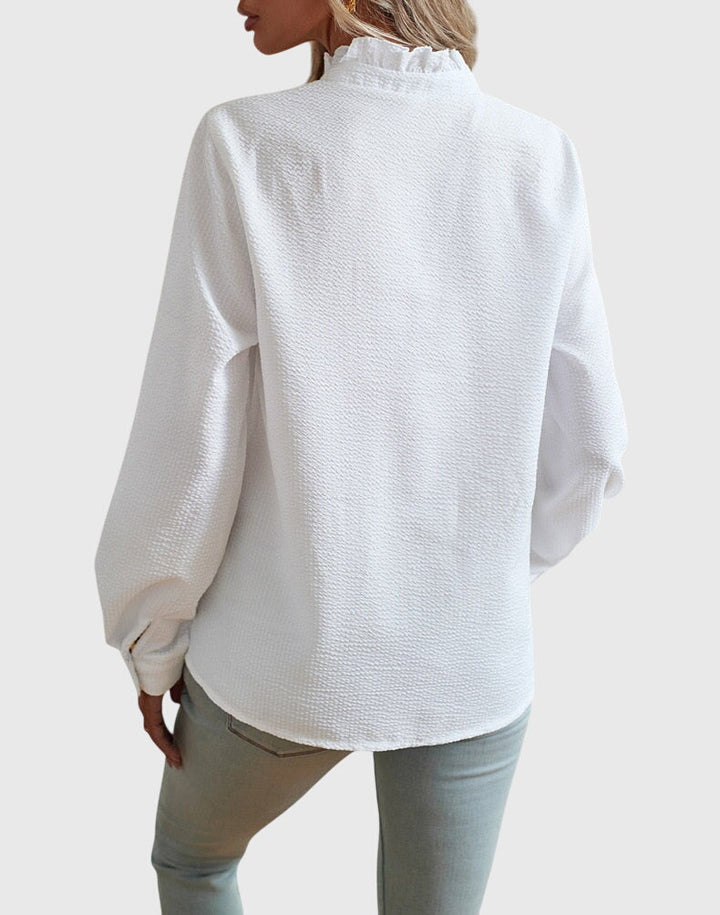 Classic women's elegant blouse, offering a chic, versatile fashion choice for spring and office wear.
