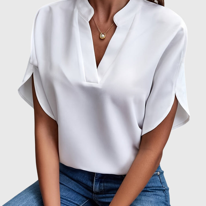 Elegant women's chic blouse, perfect for office wear or a stylish casual look.