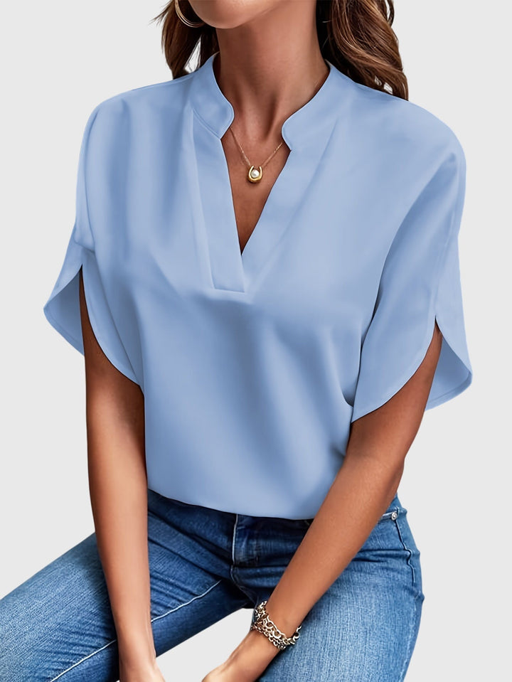 Versatile women's blouse, chic and elegant top for office wear or casual style.