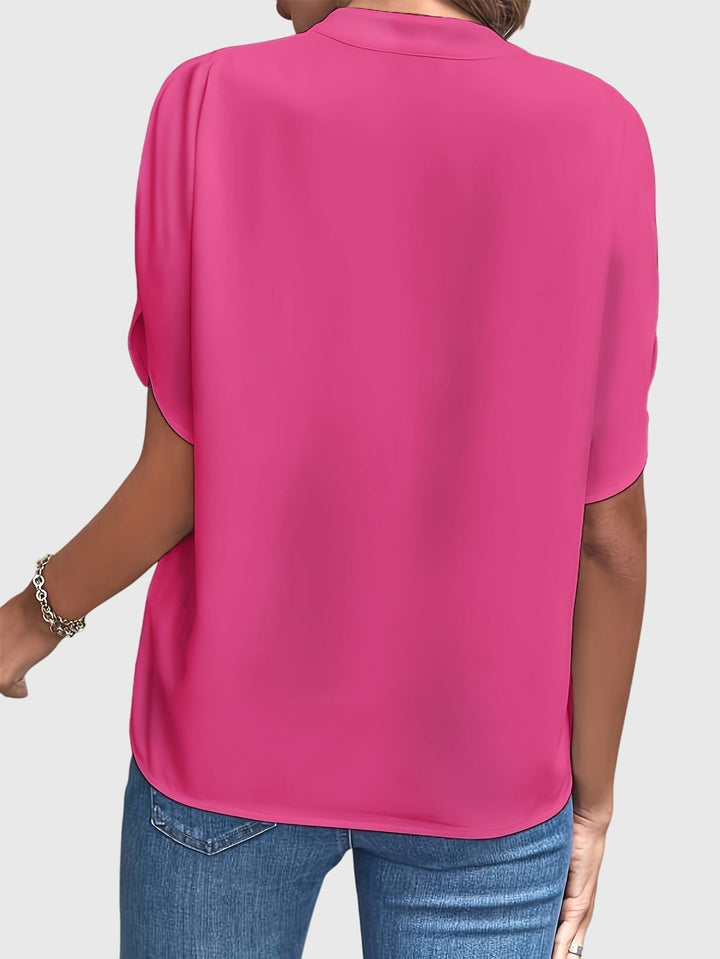 Versatile long sleeve women's blouse, a stylish and elegant top for ladies.