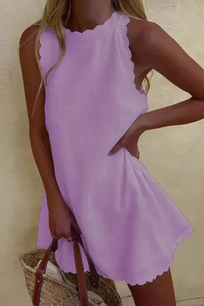 Chic women's mini cocktail dress, tailored for an elegant and flattering fit, perfect for parties.