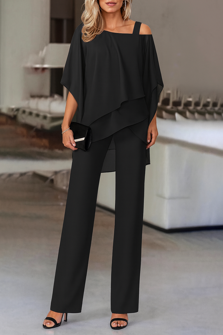 Women's chic cold-shoulder top and wide-leg pants set. Perfect elegant outfit for parties & modern fashion.