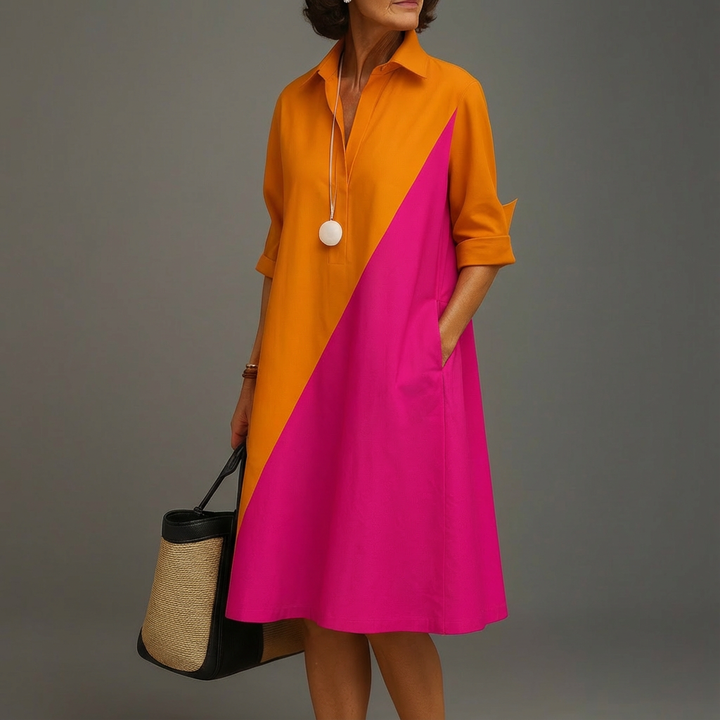 Elegant women's color-block midi dress with modern A-line style and button-down front, perfect for chic fashion.