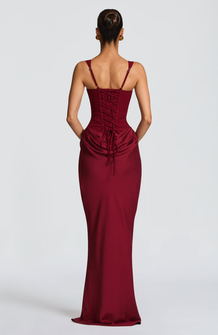 Comfortable women's corset maxi dress with wide straps & elegant draped skirt for special occasions.