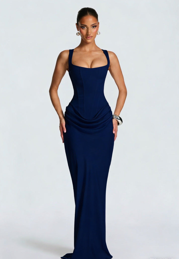 Women's elegant corset bodice maxi dress with wide straps & a flowing draped skirt, for formal events.