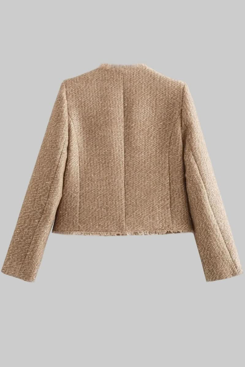 Sophisticated women's tailored cropped blazer featuring a chic silhouette & elegant button detail.