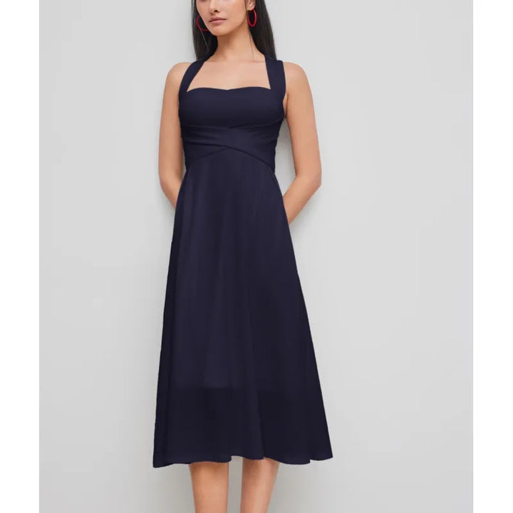 Crisp white cross-waist midi dress for women, with a chic square neckline, sleeveless cut, & A-line elegance.