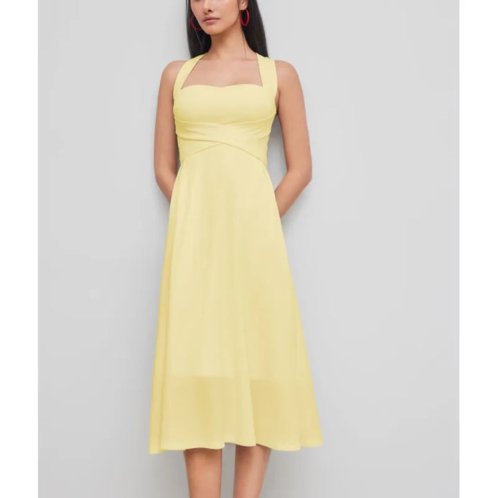 Women's elegant cross-waist midi dress showcasing a distinctive square neckline & A-line silhouette. Chic fashion.