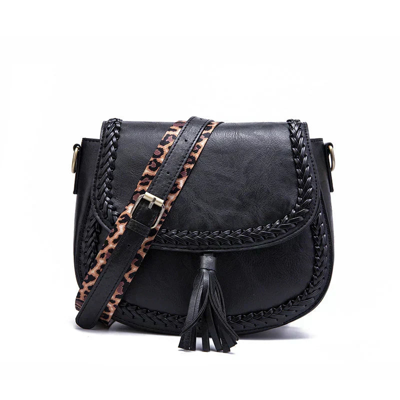 Stylish women's shoulder bag with tassel, versatile for daily use. Available in classic colors.
