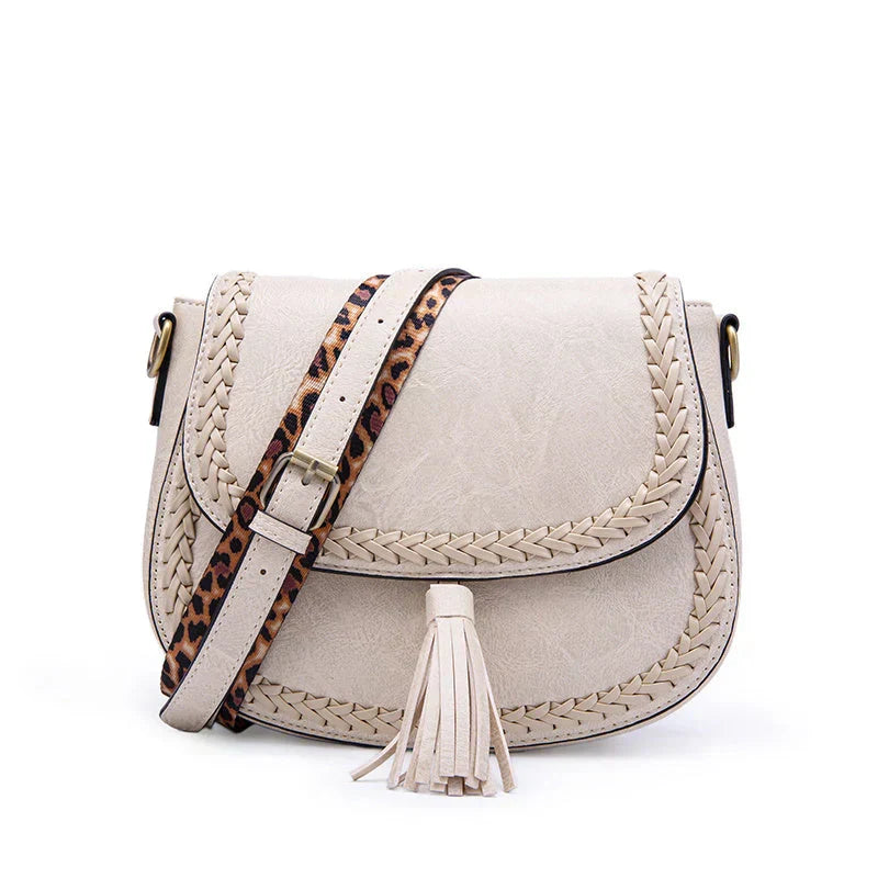 Versatile women's elegant crossbody purse. Features a stylish tassel, ideal for daily carry & accessories.