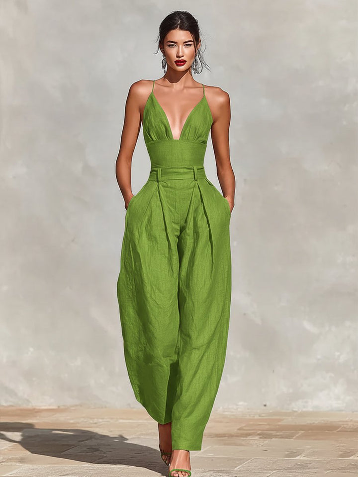 Formal women's deep V-neck sleeveless jumpsuit, featuring a flattering wide-leg silhouette for events.