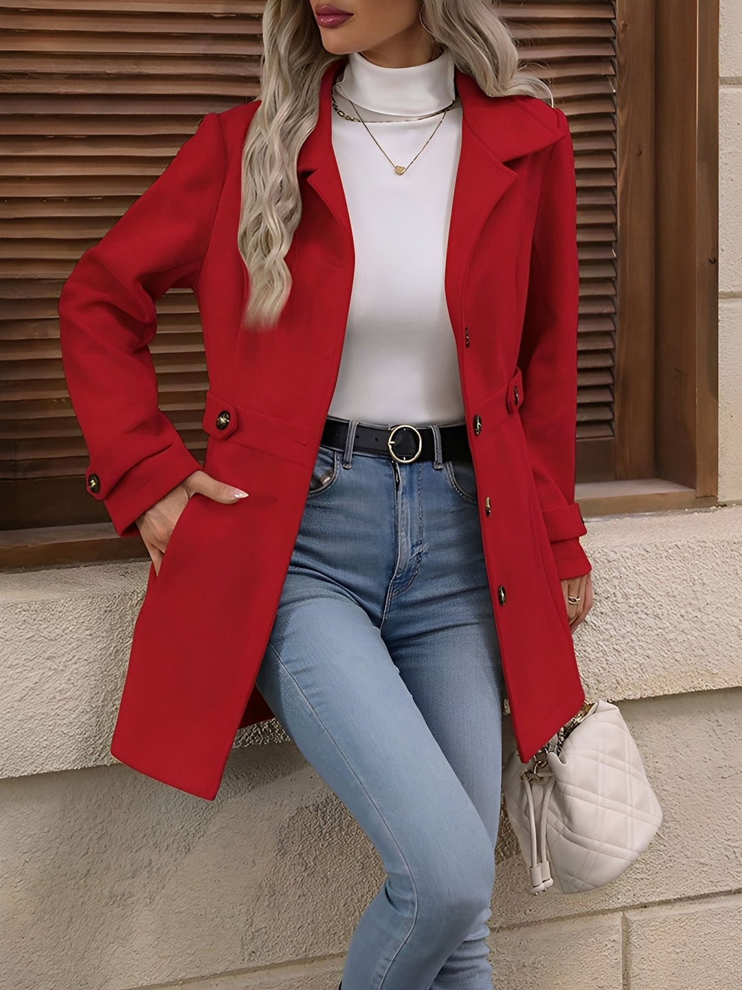 Stylish women's spring jacket: double-breasted trench coat with elegant belt detail.