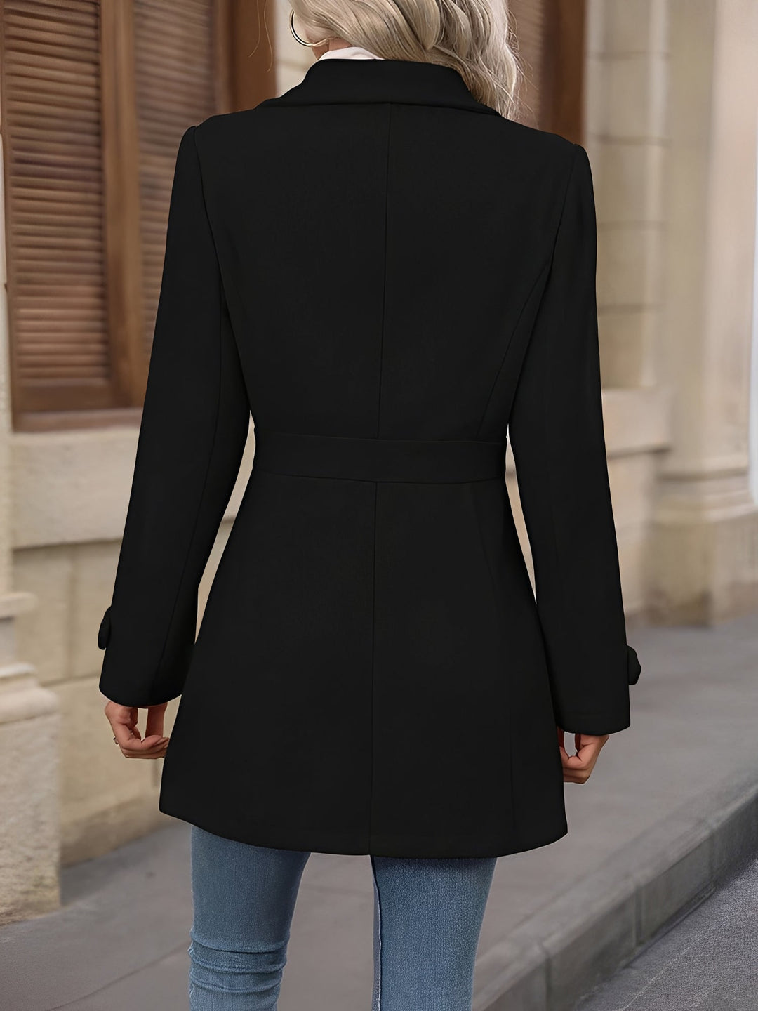 Women's sophisticated trench coat with stylish double-breasted closure & belted waist.
