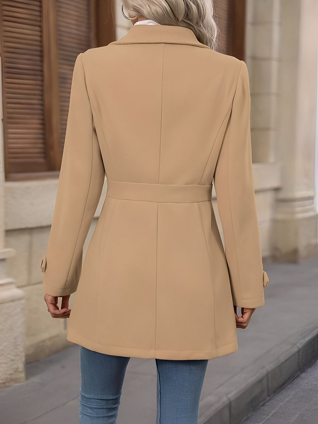 Sophisticated women's trench coat with belt, perfect for office wear & transitional weather.