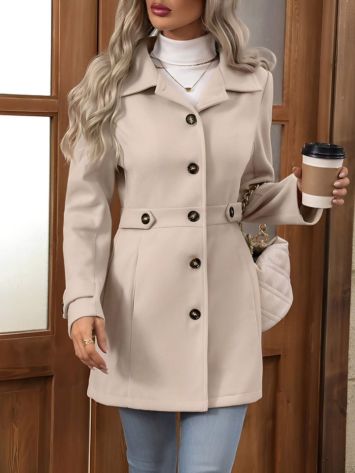 Classic women's outerwear: elegant double-breasted belted trench coat for spring/fall.