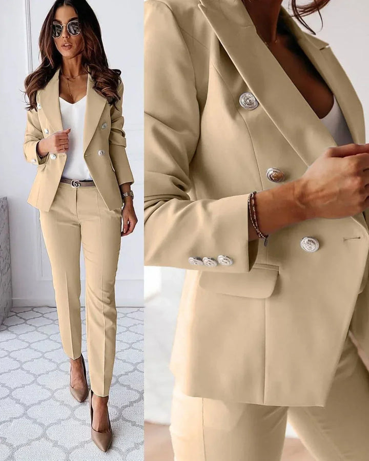 Professional women's two-piece suit: chic double-breasted blazer & tailored trousers for office fashion.