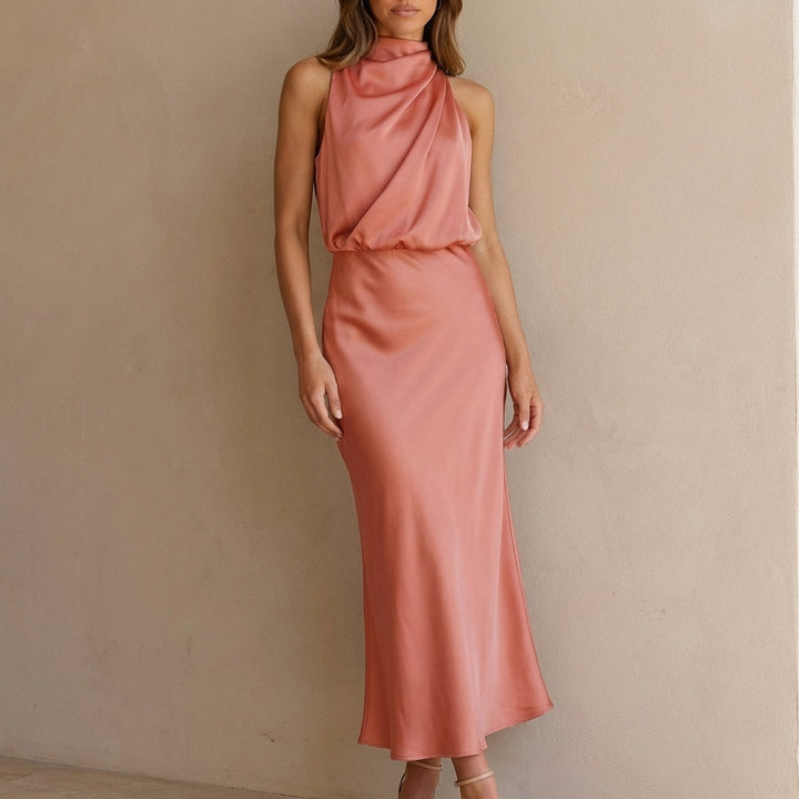 Formal women's midi dress with a draped halter neck and blouson waist, perfect for party wear.