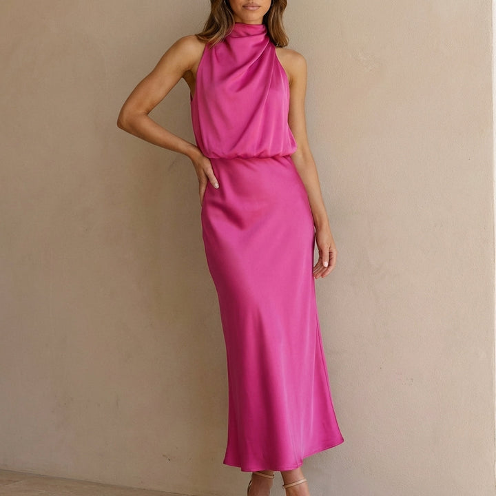 Stylish women's sleeveless midi, elegant draped halter neck and blouson waist for any special occasion.