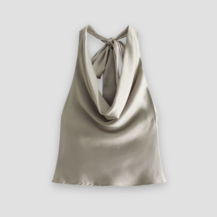 Chic sleeveless halter neck tank top, perfect for women's evening wear and stylish occasions.