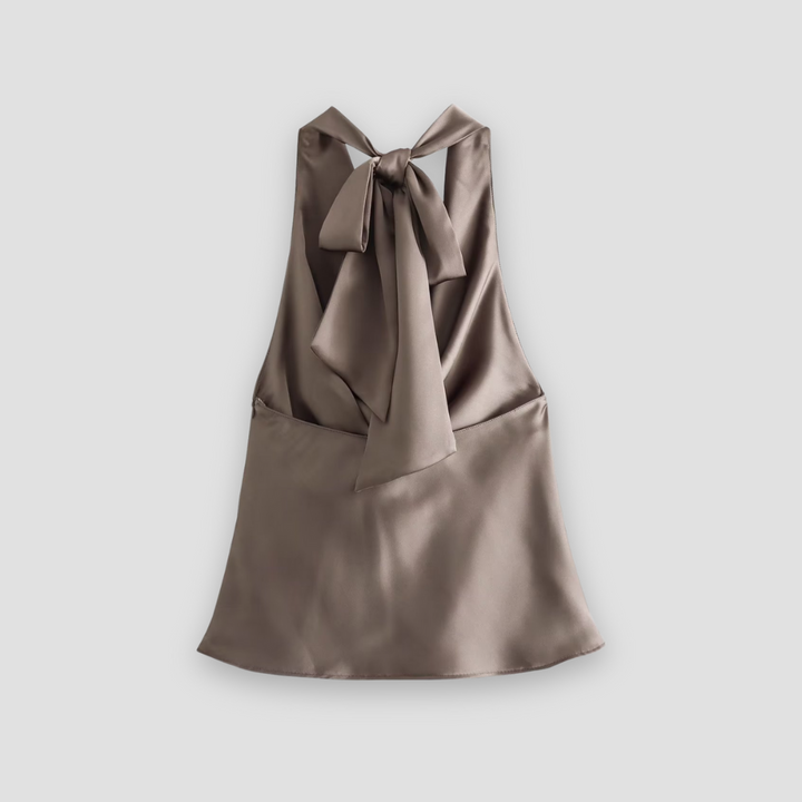 Stylish women's summer fashion halter tank top, elegantly draped for a chic look.